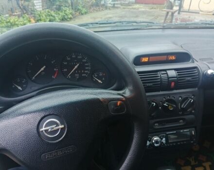 Черный Опель Корса, объемом двигателя 1.2 л и пробегом 234 тыс. км за 2200 $, фото 4 на Automoto.ua