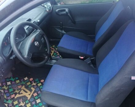 Черный Опель Корса, объемом двигателя 1.2 л и пробегом 234 тыс. км за 2200 $, фото 3 на Automoto.ua