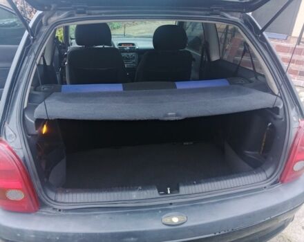 Черный Опель Корса, объемом двигателя 1.2 л и пробегом 234 тыс. км за 2200 $, фото 7 на Automoto.ua