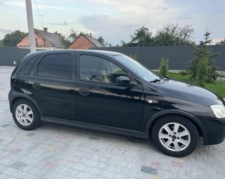Черный Опель Корса, объемом двигателя 1.2 л и пробегом 280 тыс. км за 3900 $, фото 1 на Automoto.ua