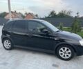 Черный Опель Корса, объемом двигателя 1.2 л и пробегом 280 тыс. км за 3900 $, фото 1 на Automoto.ua