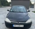 Черный Опель Корса, объемом двигателя 1.2 л и пробегом 280 тыс. км за 3900 $, фото 2 на Automoto.ua