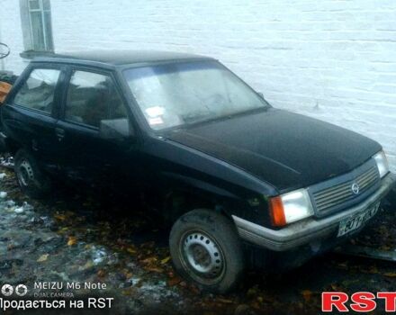 Черный Опель Корса, объемом двигателя 10 л и пробегом 250 тыс. км за 300 $, фото 1 на Automoto.ua