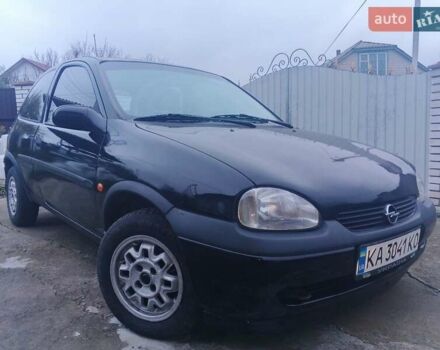 Черный Опель Корса, объемом двигателя 1.2 л и пробегом 235 тыс. км за 2200 $, фото 1 на Automoto.ua