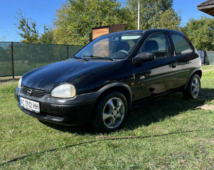 Черный Опель Корса, объемом двигателя 1.2 л и пробегом 400 тыс. км за 2400 $, фото 1 на Automoto.ua