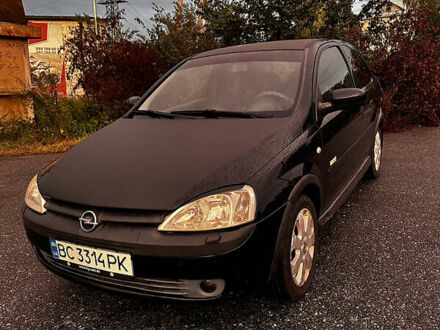 Чорний Опель Корса, об'ємом двигуна 1.23 л та пробігом 328 тис. км за 3100 $, фото 1 на Automoto.ua