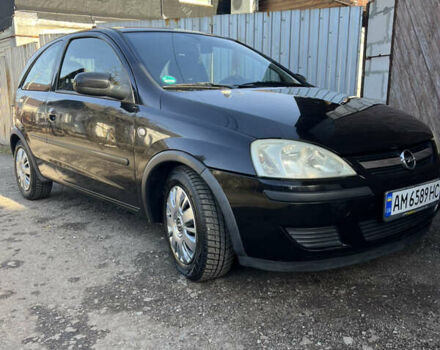 Черный Опель Корса, объемом двигателя 1.2 л и пробегом 224 тыс. км за 2600 $, фото 1 на Automoto.ua