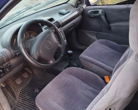 Фиолетовый Опель Корса, объемом двигателя 1.4 л и пробегом 300 тыс. км за 750 $, фото 4 на Automoto.ua