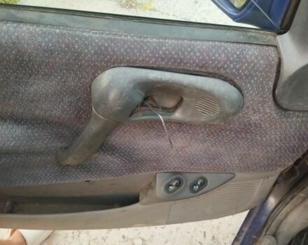 Фиолетовый Опель Корса, объемом двигателя 1.4 л и пробегом 300 тыс. км за 750 $, фото 5 на Automoto.ua