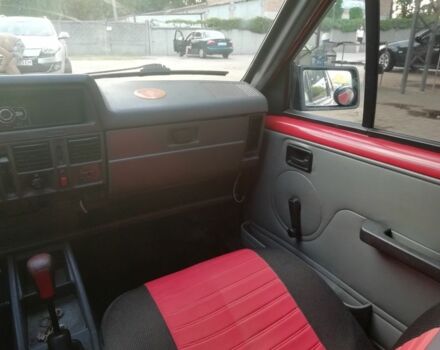 Красный Опель Корса, объемом двигателя 1 л и пробегом 1000 тыс. км за 544 $, фото 6 на Automoto.ua