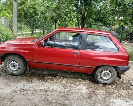 Красный Опель Корса, объемом двигателя 1.2 л и пробегом 3 тыс. км за 381 $, фото 1 на Automoto.ua