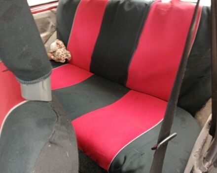 Красный Опель Корса, объемом двигателя 1.2 л и пробегом 3 тыс. км за 381 $, фото 4 на Automoto.ua