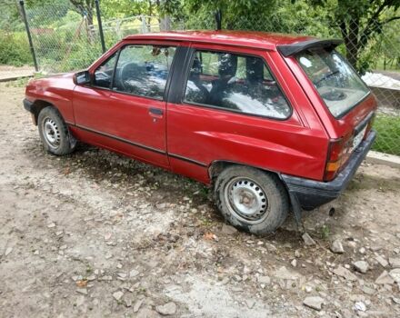 Красный Опель Корса, объемом двигателя 1.2 л и пробегом 3 тыс. км за 381 $, фото 6 на Automoto.ua