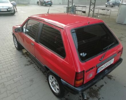 Красный Опель Корса, объемом двигателя 1 л и пробегом 1000 тыс. км за 544 $, фото 7 на Automoto.ua