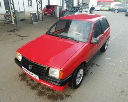 Красный Опель Корса, объемом двигателя 1 л и пробегом 1000 тыс. км за 544 $, фото 1 на Automoto.ua