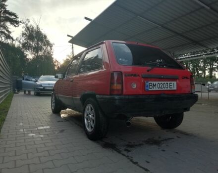 Красный Опель Корса, объемом двигателя 1 л и пробегом 1000 тыс. км за 544 $, фото 8 на Automoto.ua