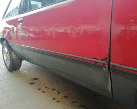 Красный Опель Корса, объемом двигателя 1 л и пробегом 1000 тыс. км за 544 $, фото 3 на Automoto.ua