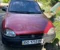 Красный Опель Корса, объемом двигателя 1.4 л и пробегом 330 тыс. км за 1100 $, фото 1 на Automoto.ua