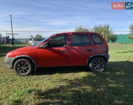 Красный Опель Корса, объемом двигателя 1.2 л и пробегом 285 тыс. км за 1500 $, фото 11 на Automoto.ua