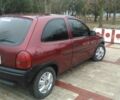 Красный Опель Корса, объемом двигателя 1.2 л и пробегом 260 тыс. км за 2600 $, фото 1 на Automoto.ua