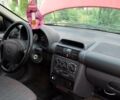 Красный Опель Корса, объемом двигателя 1.2 л и пробегом 280 тыс. км за 1400 $, фото 6 на Automoto.ua