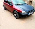 Красный Опель Корса, объемом двигателя 1.2 л и пробегом 350 тыс. км за 1450 $, фото 1 на Automoto.ua