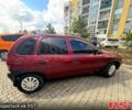 Красный Опель Корса, объемом двигателя 1.2 л и пробегом 230 тыс. км за 1500 $, фото 1 на Automoto.ua