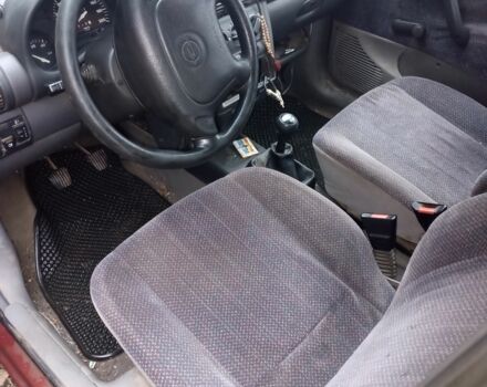 Красный Опель Корса, объемом двигателя 0 л и пробегом 139 тыс. км за 712 $, фото 7 на Automoto.ua