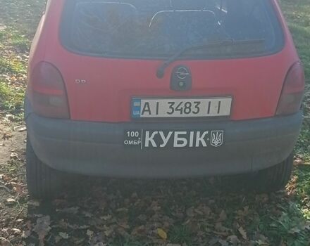 Красный Опель Корса, объемом двигателя 1.2 л и пробегом 222 тыс. км за 1318 $, фото 4 на Automoto.ua