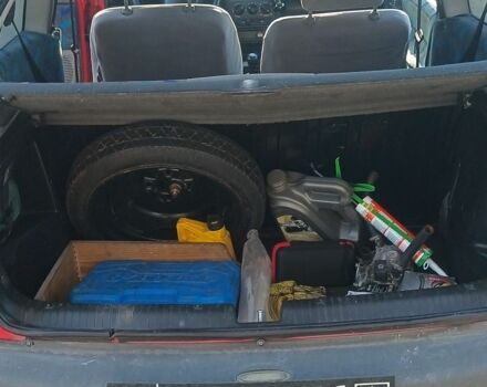 Красный Опель Корса, объемом двигателя 1.2 л и пробегом 222 тыс. км за 1318 $, фото 7 на Automoto.ua