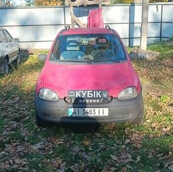 Красный Опель Корса, объемом двигателя 1.2 л и пробегом 140 тыс. км за 1400 $, фото 6 на Automoto.ua