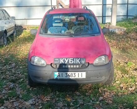 Красный Опель Корса, объемом двигателя 1.2 л и пробегом 222 тыс. км за 1318 $, фото 1 на Automoto.ua