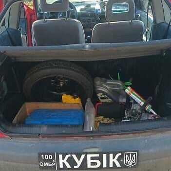 Красный Опель Корса, объемом двигателя 1.2 л и пробегом 222 тыс. км за 1318 $, фото 6 на Automoto.ua