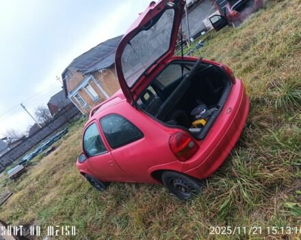 Красный Опель Корса, объемом двигателя 1.2 л и пробегом 250 тыс. км за 1182 $, фото 2 на Automoto.ua