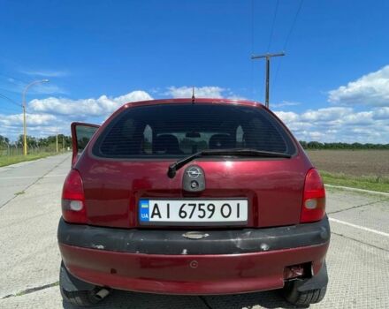 Красный Опель Корса, объемом двигателя 1.2 л и пробегом 235 тыс. км за 2200 $, фото 4 на Automoto.ua