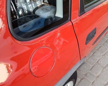 Красный Опель Корса, объемом двигателя 1.2 л и пробегом 130 тыс. км за 2800 $, фото 3 на Automoto.ua