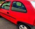 Красный Опель Корса, объемом двигателя 1.4 л и пробегом 247 тыс. км за 2500 $, фото 1 на Automoto.ua