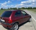 Красный Опель Корса, объемом двигателя 1.2 л и пробегом 235 тыс. км за 2200 $, фото 7 на Automoto.ua