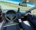 Красный Опель Корса, объемом двигателя 1.2 л и пробегом 235 тыс. км за 2200 $, фото 6 на Automoto.ua