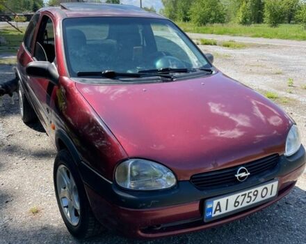 Красный Опель Корса, объемом двигателя 1.2 л и пробегом 235 тыс. км за 2200 $, фото 2 на Automoto.ua