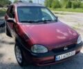 Красный Опель Корса, объемом двигателя 1.2 л и пробегом 235 тыс. км за 2200 $, фото 2 на Automoto.ua