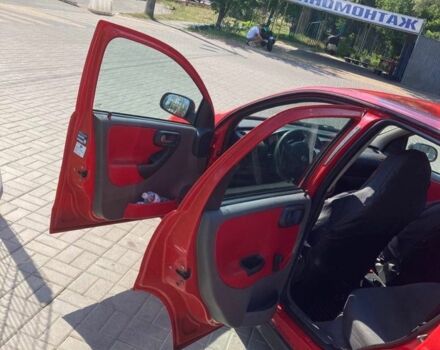 Красный Опель Корса, объемом двигателя 0.18 л и пробегом 178 тыс. км за 4100 $, фото 12 на Automoto.ua