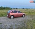 Красный Опель Корса, объемом двигателя 1.69 л и пробегом 353 тыс. км за 3600 $, фото 6 на Automoto.ua