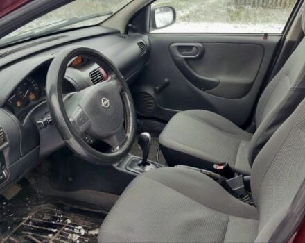 Красный Опель Корса, объемом двигателя 1 л и пробегом 216 тыс. км за 3300 $, фото 7 на Automoto.ua