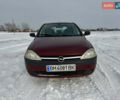 Красный Опель Корса, объемом двигателя 0.97 л и пробегом 216 тыс. км за 2999 $, фото 1 на Automoto.ua
