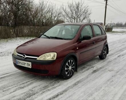 Красный Опель Корса, объемом двигателя 1 л и пробегом 216 тыс. км за 3300 $, фото 1 на Automoto.ua