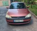 Красный Опель Корса, объемом двигателя 1.2 л и пробегом 187 тыс. км за 3038 $, фото 1 на Automoto.ua