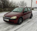 Красный Опель Корса, объемом двигателя 0.97 л и пробегом 216 тыс. км за 3050 $, фото 1 на Automoto.ua