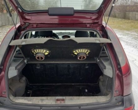 Красный Опель Корса, объемом двигателя 1 л и пробегом 216 тыс. км за 3300 $, фото 5 на Automoto.ua