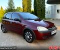 Червоний Опель Корса, об'ємом двигуна 1 л та пробігом 216 тис. км за 3300 $, фото 1 на Automoto.ua